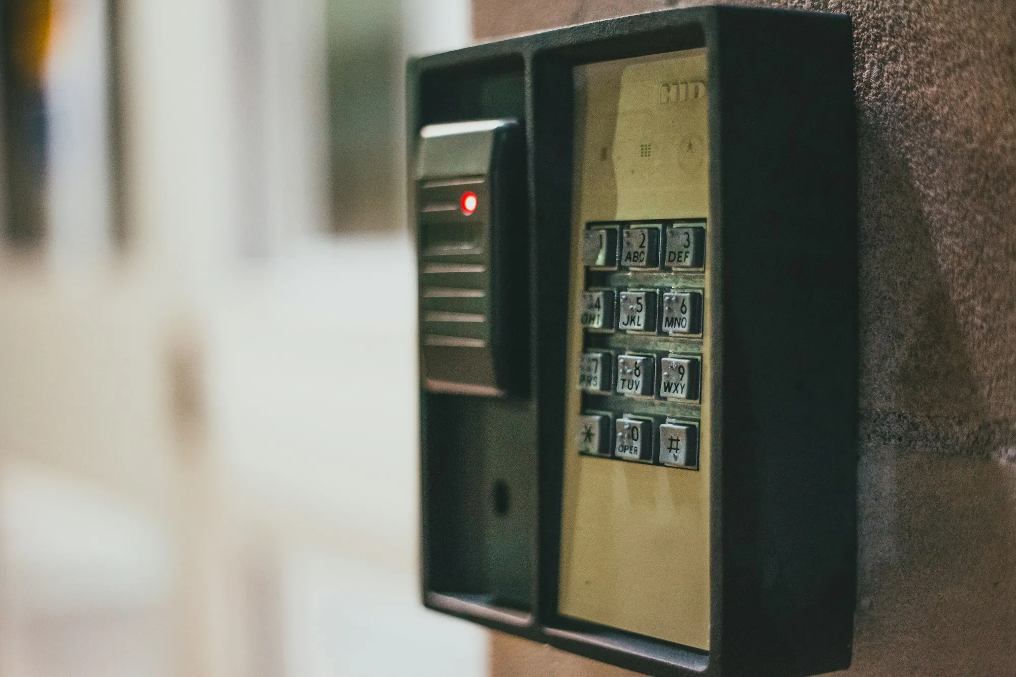 Card reader and keypad mounted at an entrance