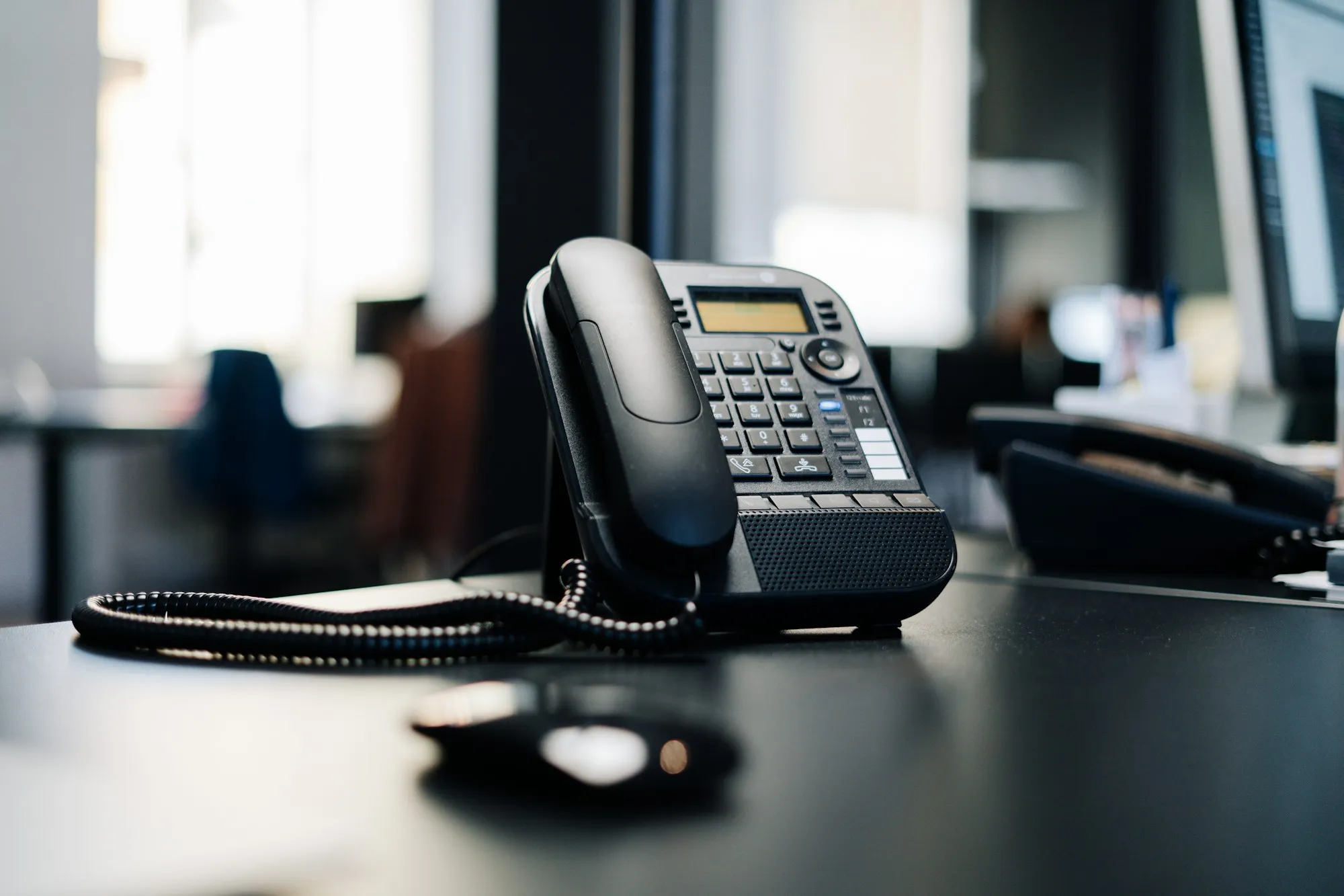Desk phone on an office workstation