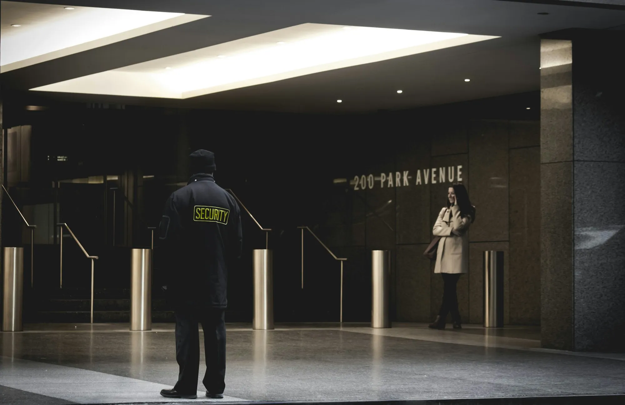 Security guard on duty in an office building lobby